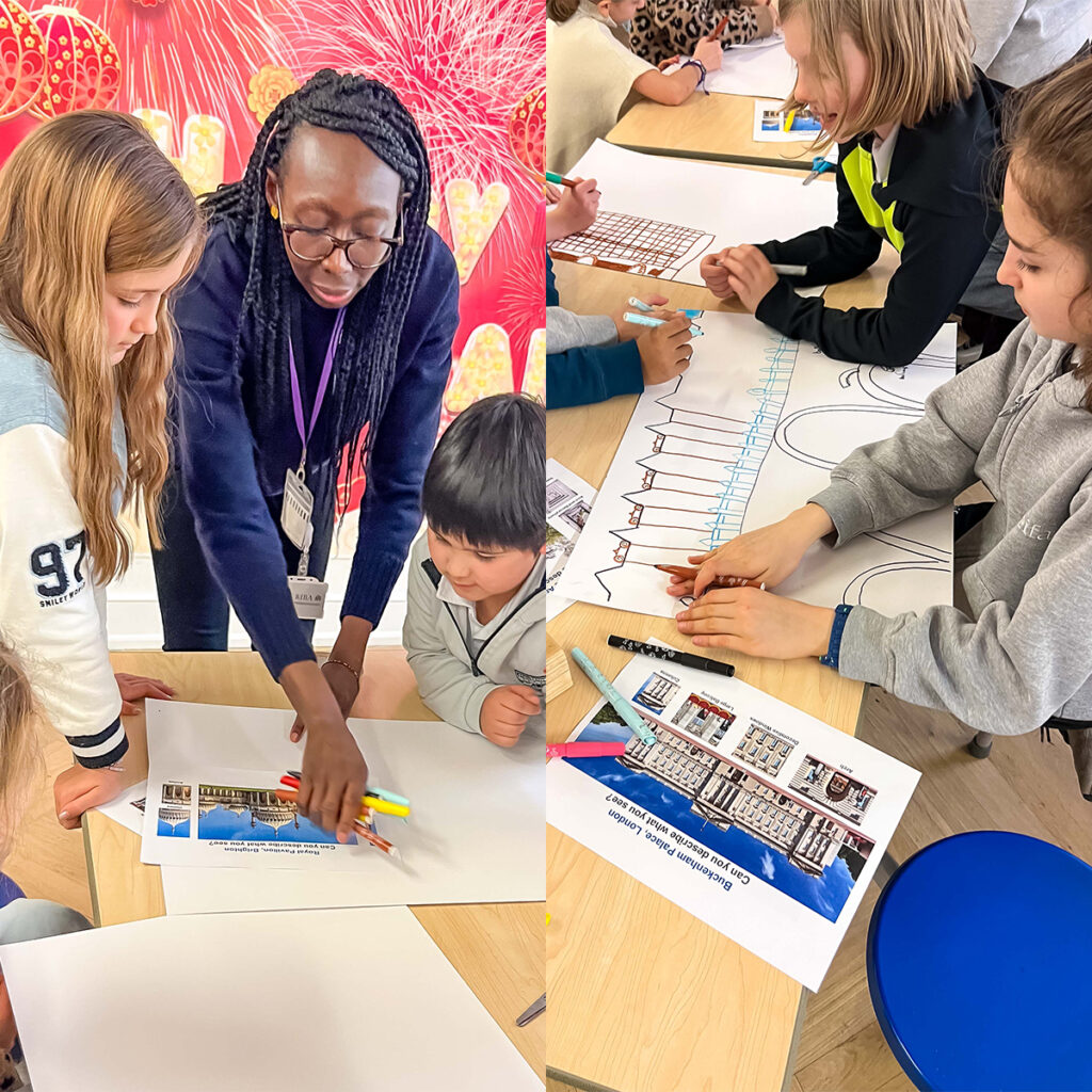 EIFA Teacher guiding students in a classroom art project. Students are drawing on large sheets of paper and coloring images of buildings, engaged and collaborating around the table. Bright, festive decorations in the background.